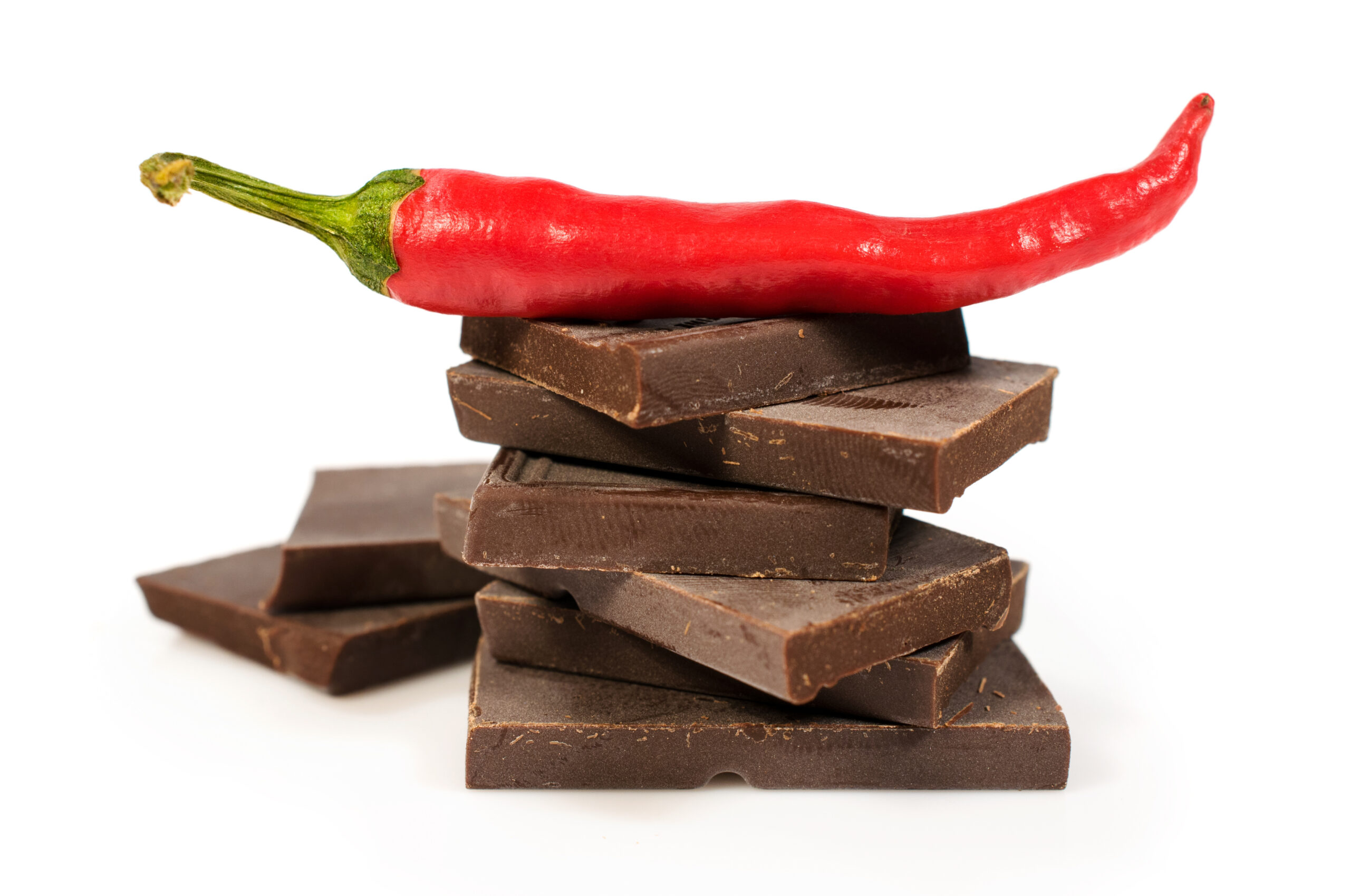 Dunkle Schokolade mit feinem Chili, leichte Schärfe – Die Familienrösterei